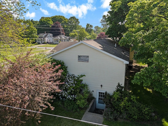 632 Green St, South Haven, MI 49090 - view of property exterior featuring roof with shingles