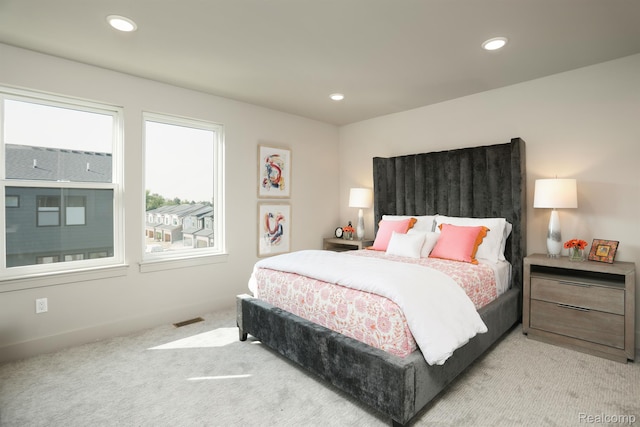 2133 Evergreen Ln Unit 28, Ann Arbor, MI 48103 - bedroom with light colored carpet and recessed lighting