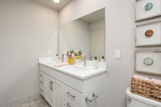 2133 Evergreen Ln Unit 28, Ann Arbor, MI 48103 - bathroom with double vanity and recessed lighting