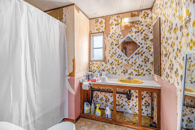 1715 S 48th Ave, Shelby, MI 49455 - bathroom featuring wallpapered walls, tile patterned flooring, and vanity