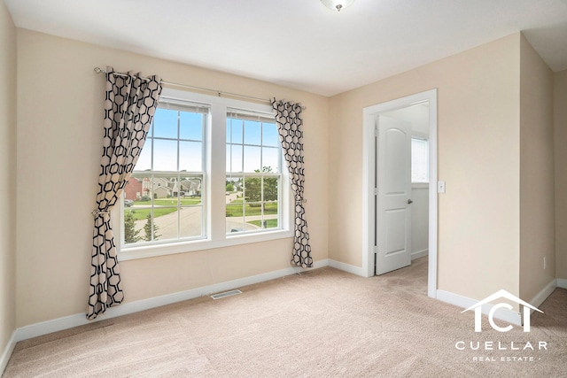 9365 Windward Dr, West Olive, MI 49460 - empty room featuring carpet and baseboards