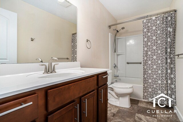9365 Windward Dr, West Olive, MI 49460 - full bath with vanity, shower / bath combination with curtain, and stone finish flooring