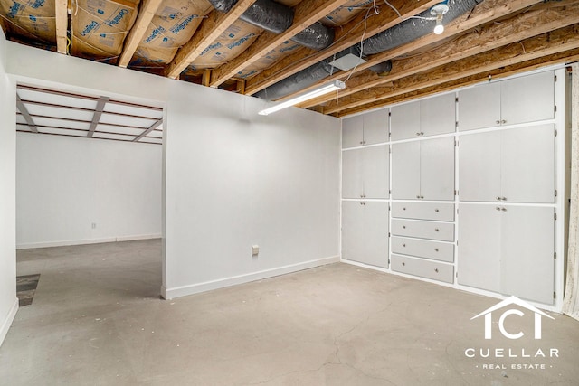 9365 Windward Dr, West Olive, MI 49460 - basement featuring baseboards