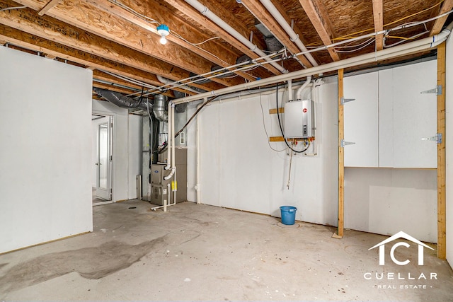9365 Windward Dr, West Olive, MI 49460 - unfinished below grade area with heating unit and electric panel