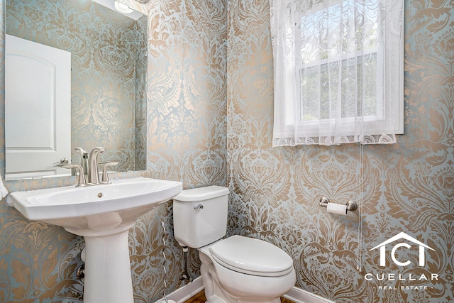 9365 Windward Dr, West Olive, MI 49460 - half bath featuring wallpapered walls