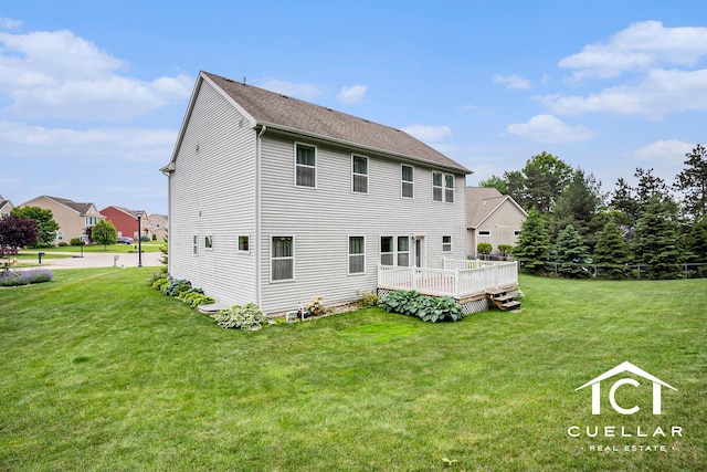9365 Windward Dr, West Olive, MI 49460 - rear view of property with a yard, a deck, and a shingled roof