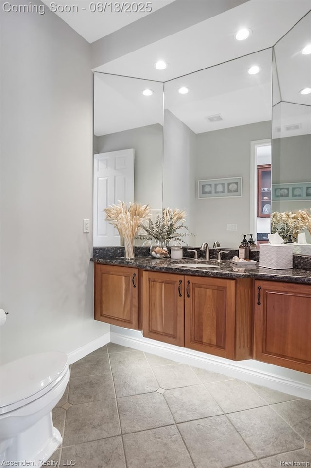 48392 Binghampton Dr, Northville, MI 48168 - bathroom with tile patterned floors, vanity, and recessed lighting