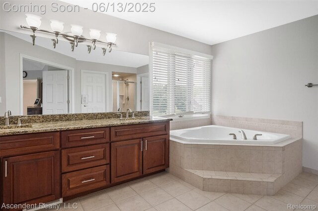 48392 Binghampton Dr, Northville, MI 48168 - bathroom featuring double vanity, tile patterned floors, a bath, and a shower stall