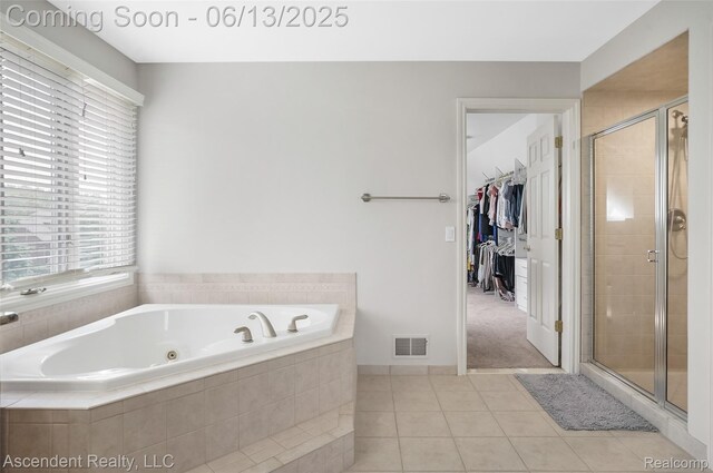 48392 Binghampton Dr, Northville, MI 48168 - full bath with a whirlpool tub, plenty of natural light, and a shower stall