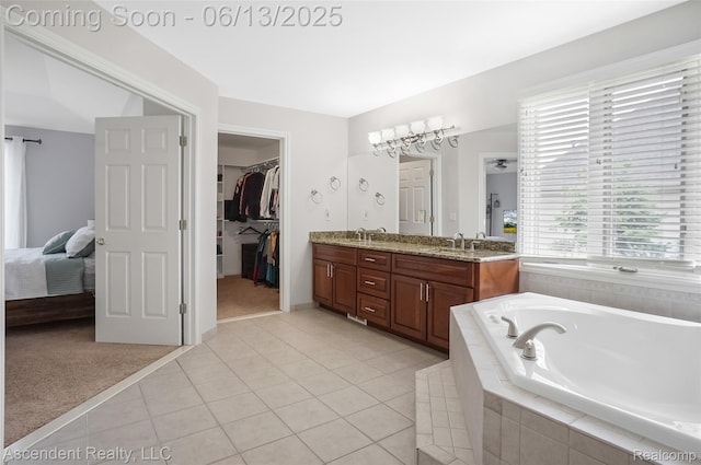 48392 Binghampton Dr, Northville, MI 48168 - ensuite bathroom with double vanity, a garden tub, tile patterned floors, and a walk in closet