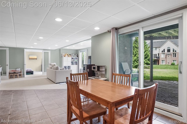 48392 Binghampton Dr, Northville, MI 48168 - carpeted dining room featuring tile patterned flooring, recessed lighting, and a paneled ceiling