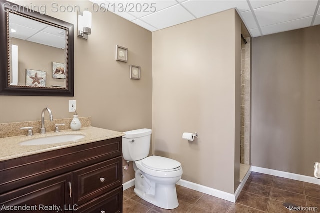48392 Binghampton Dr, Northville, MI 48168 - full bath with a paneled ceiling, tile patterned floors, vanity, and a walk in shower
