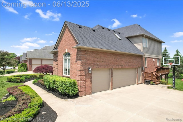 48392 Binghampton Dr, Northville, MI 48168 - view of property exterior with brick siding, roof with shingles, concrete driveway, and an attached garage