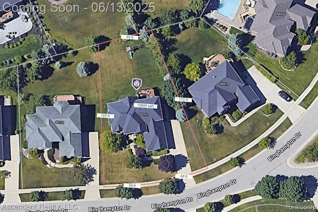 48392 Binghampton Dr, Northville, MI 48168 - aerial perspective of suburban area featuring property boundaries highlighted