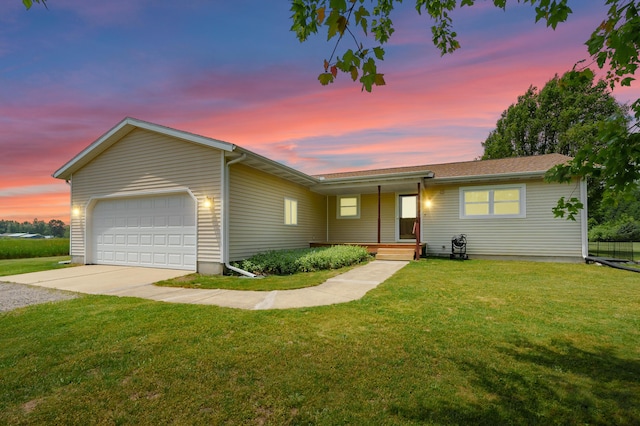 14244 36th St, Gobles, MI 49055 - ranch-style house with an attached garage, driveway, and a yard