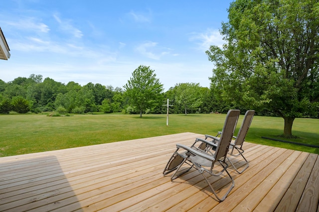 14244 36th St, Gobles, MI 49055 - wooden terrace featuring a lawn and view of scattered trees