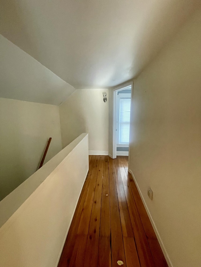 408 Wilkinson St, Chelsea, MI 48118 - corridor with an upstairs landing, dark wood-style floors, and lofted ceiling