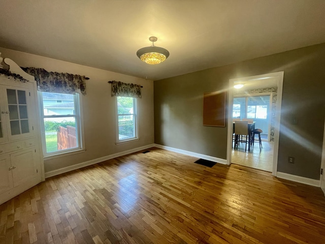 408 Wilkinson St, Chelsea, MI 48118 - unfurnished dining area with wood finished floors and plenty of natural light