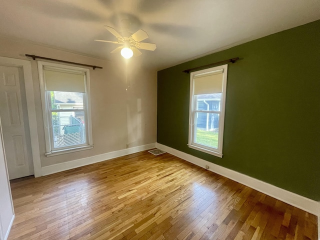 408 Wilkinson St, Chelsea, MI 48118 - spare room featuring wood-type flooring and a ceiling fan