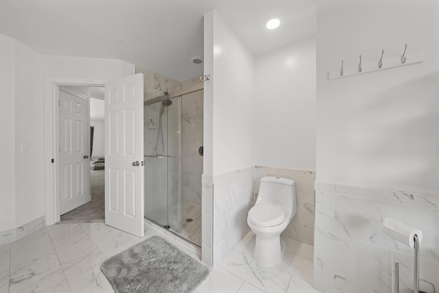 7624 Quail Ridge Dr, Dexter, MI 48130 - full bath with a marble finish shower, marble finish flooring, wainscoting, tile walls, and recessed lighting