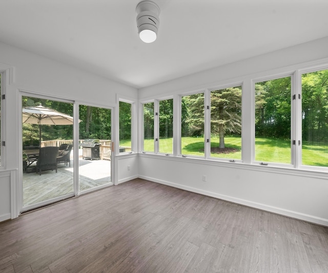 7624 Quail Ridge Dr, Dexter, MI 48130 - unfurnished sunroom with plenty of natural light