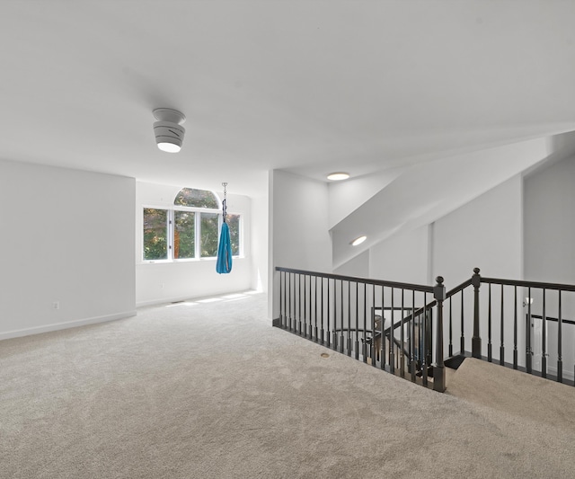 7624 Quail Ridge Dr, Dexter, MI 48130 - carpeted empty room featuring baseboards