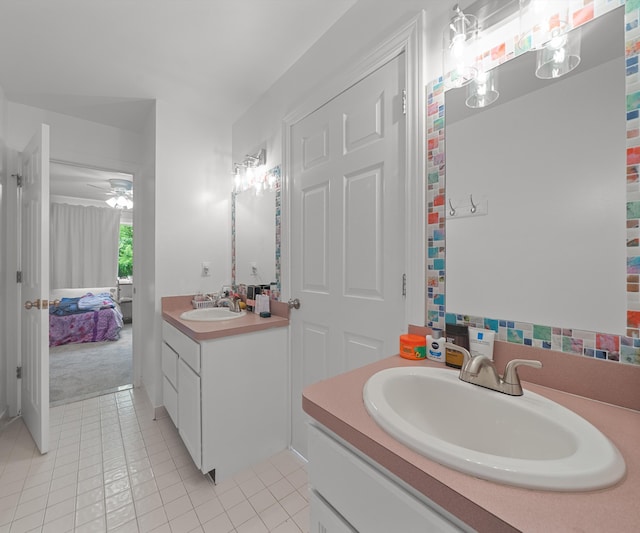 7624 Quail Ridge Dr, Dexter, MI 48130 - full bath with vanity, tile patterned floors, and a ceiling fan