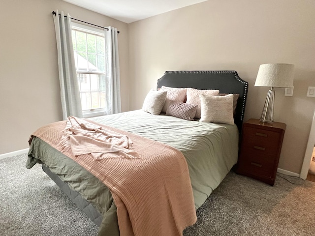 3676 Brentwood St Unit 30, Norton Shores, MI 49441 - carpeted bedroom with baseboards