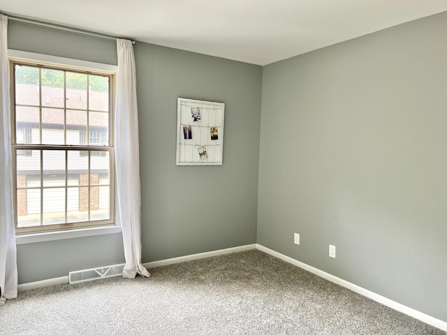 3676 Brentwood St Unit 30, Norton Shores, MI 49441 - carpeted empty room with baseboards