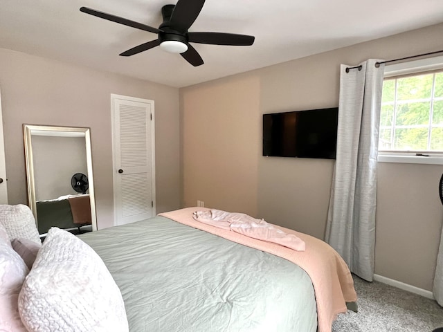 3676 Brentwood St Unit 30, Norton Shores, MI 49441 - carpeted bedroom featuring ceiling fan