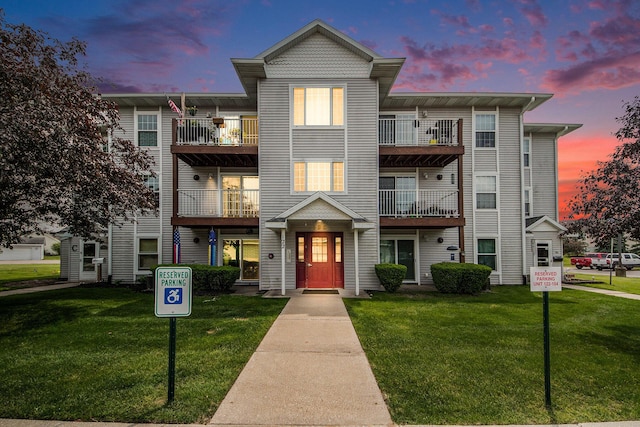 122 Ida Red Ave NW Unit 202, Sparta, MI 49345 - view of property featuring a front lawn and a balcony