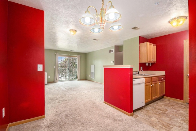 122 Ida Red Ave NW Unit 202, Sparta, MI 49345 - kitchen with white dishwasher, a textured ceiling, a chandelier, light colored carpet, and brown cabinets