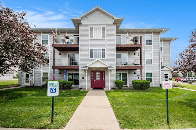 122 Ida Red Ave NW Unit 202, Sparta, MI 49345 - view of front of house featuring a front yard