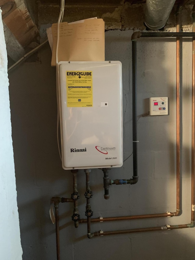 5513 S Waverly Rd, Lansing, MI 48911 - utilities featuring tankless water heater
