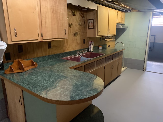 5513 S Waverly Rd, Lansing, MI 48911 - kitchen featuring dark countertops, finished concrete flooring, and a peninsula