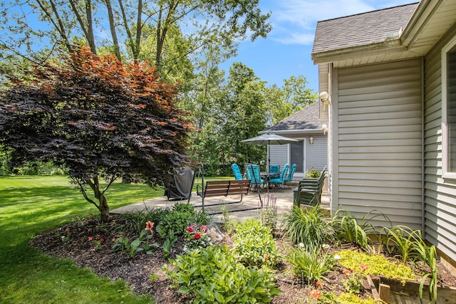 27569 Hawthorne Rd, Sturgis, MI 49091 - view of green lawn with a patio area