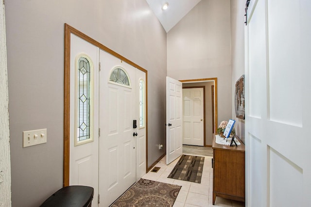 27569 Hawthorne Rd, Sturgis, MI 49091 - entryway featuring light tile patterned flooring and lofted ceiling