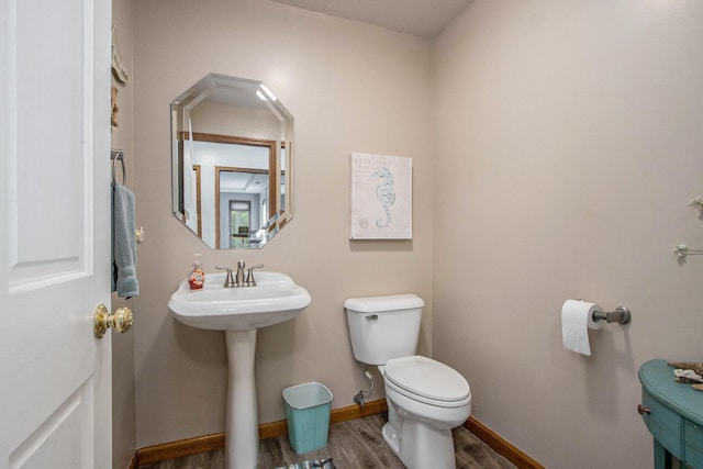 27569 Hawthorne Rd, Sturgis, MI 49091 - bathroom with toilet and wood finished floors
