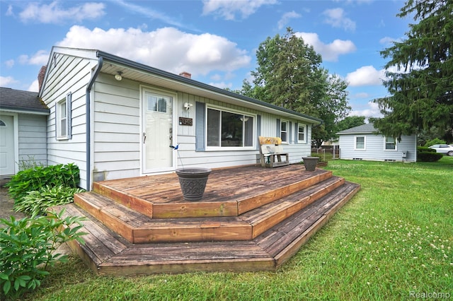 1348 Tull Dr, Waterford, MI 48327 - back of house with a lawn and a deck