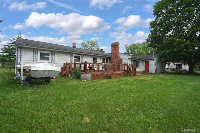 1348 Tull Dr, Waterford, MI 48327 - rear view of property with a wooden deck, a lawn, and a chimney