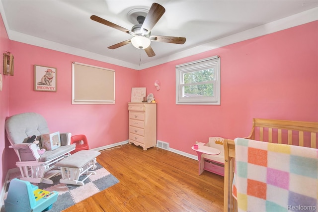 11214 Canal Rd, Sterling Heights, MI 48314 - bedroom with light wood-style flooring and ceiling fan