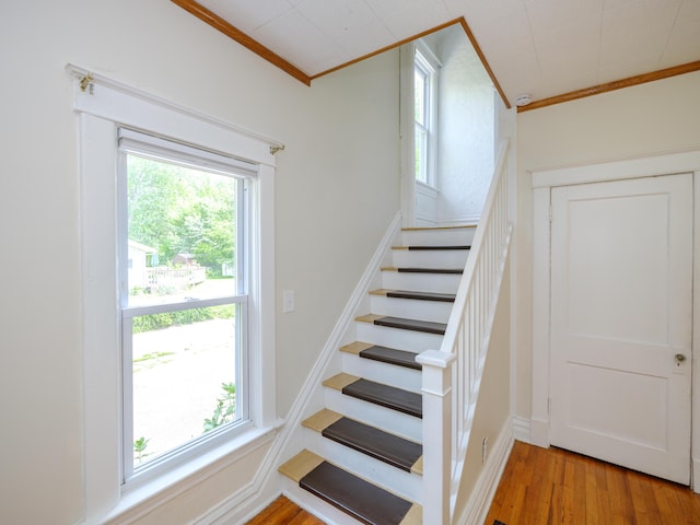1232 Upland Dr, Kalamazoo, MI 49048 - staircase featuring ornamental molding and wood finished floors