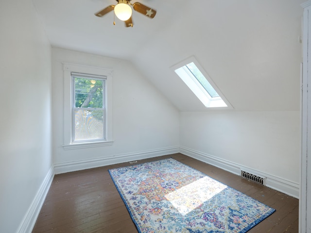 1232 Upland Dr, Kalamazoo, MI 49048 - additional living space with a skylight, dark wood-type flooring, lofted ceiling, and ceiling fan