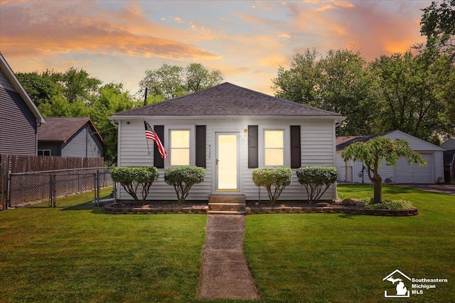 4162 9th St, Newport, MI 48166 - view of front of property featuring entry steps, roof with shingles, and an outbuilding