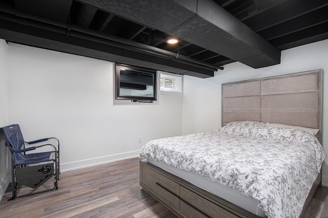 584 Benson Rd, Benton Harbor, MI 49022 - bedroom featuring wood finished floors and baseboards