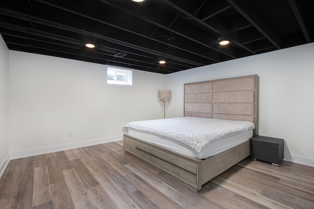 584 Benson Rd, Benton Harbor, MI 49022 - bedroom featuring wood finished floors and baseboards