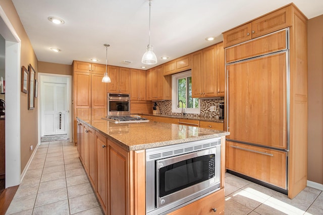 2347 W W Dowling Rd, Delton, MI 49046 - kitchen with built in appliances, backsplash, light stone countertops, recessed lighting, and light tile patterned floors