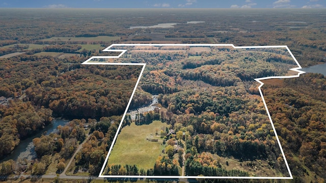 2347 W W Dowling Rd, Delton, MI 49046 - aerial overview of property's location featuring property parcel outlined and a heavily wooded area
