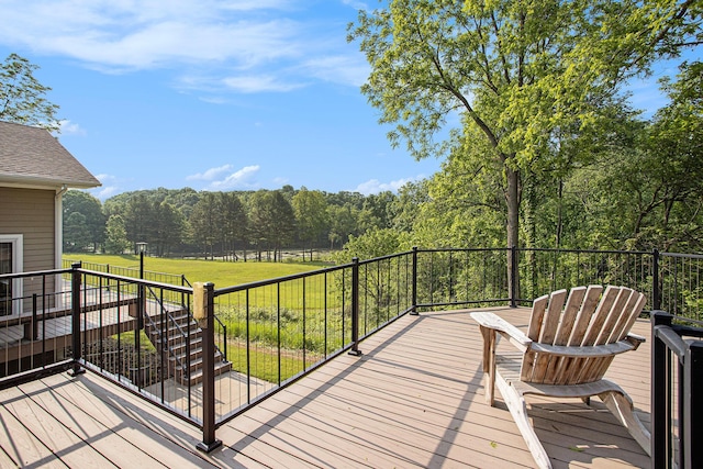 2347 W W Dowling Rd, Delton, MI 49046 - wooden terrace with a wooded view and a yard