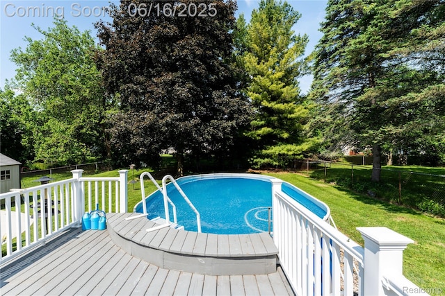 11704 Schram St, Grand Blanc, MI 48439 - view of pool featuring a wooden deck and view of wooded area